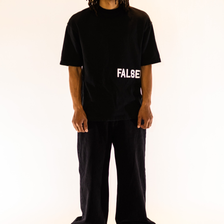 Oversized t-shirt crafted from 100% French Terry cotton, featuring a large 3D embroidered False Promises logo along the rib area.