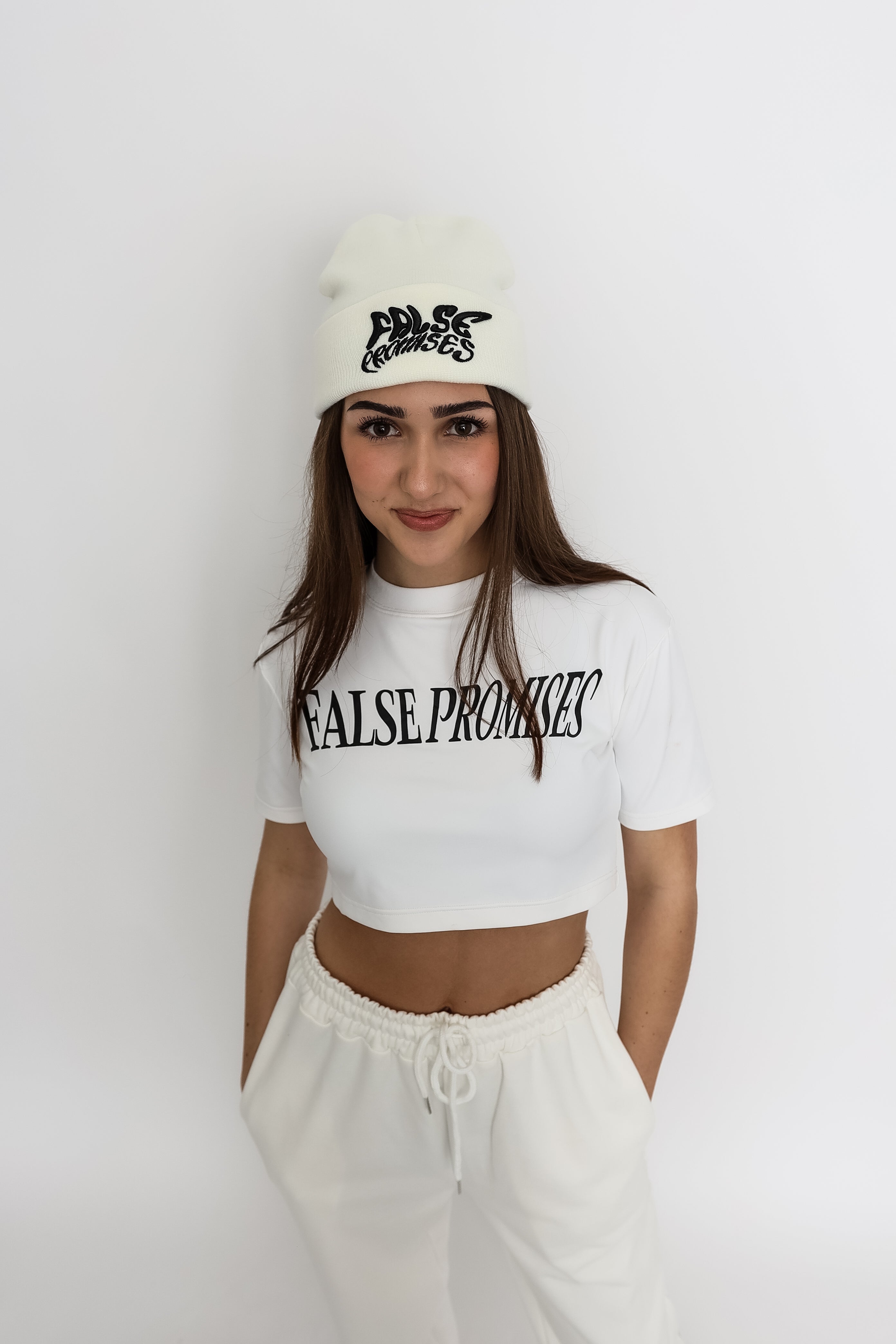 FALSE PROMISES BLACK ON WHITE KNITTED BEANIE