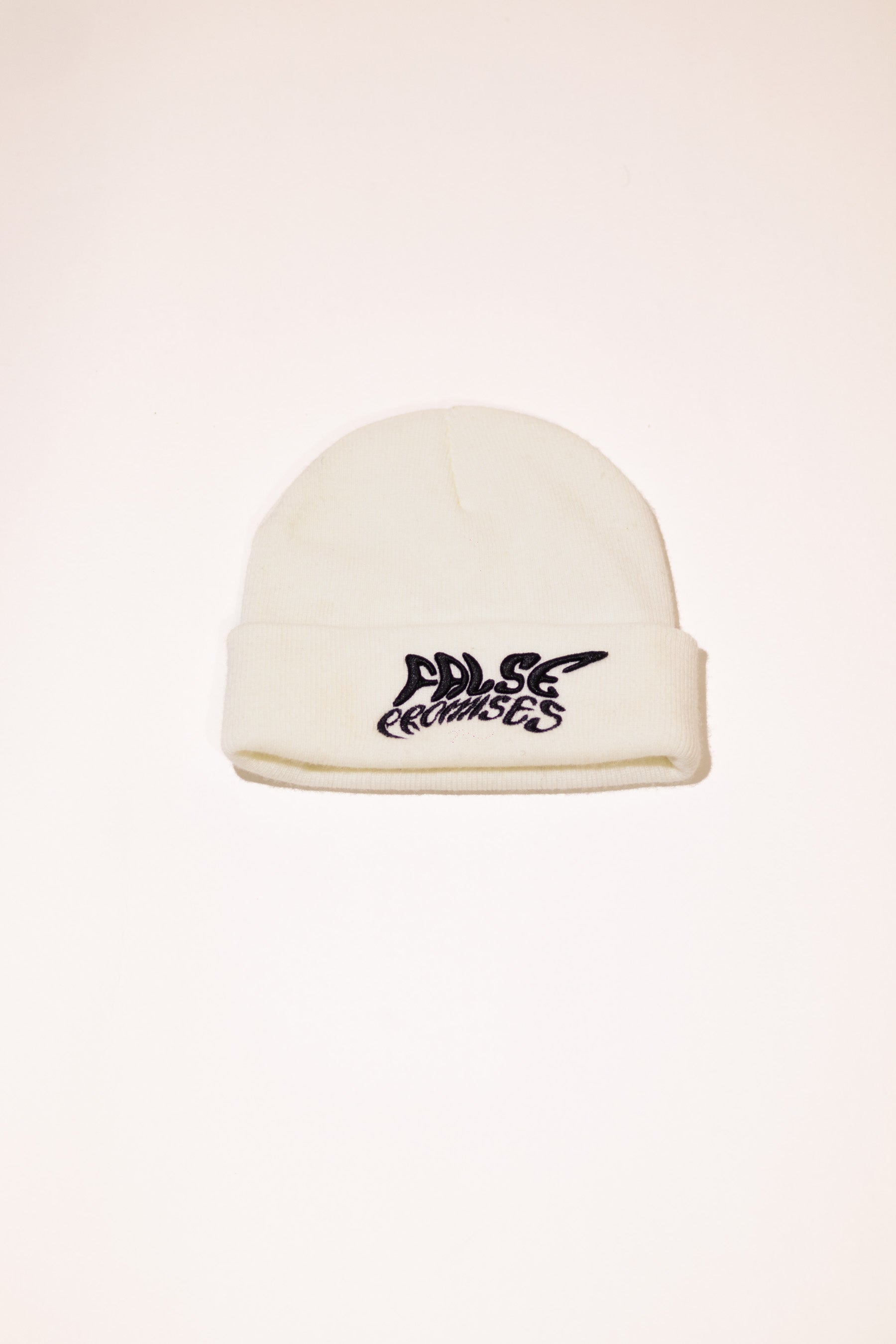 FALSE PROMISES BLACK ON WHITE KNITTED BEANIE