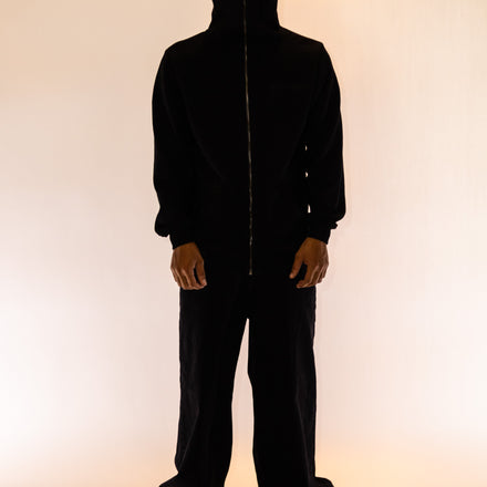 Black heavyweight full-zip hoodie crafted from 100% French Terry cotton, with custom stainless steel FP zipper, chenille embroidered logos on the hood and back, and an embroidered False Promises logo on the chest.