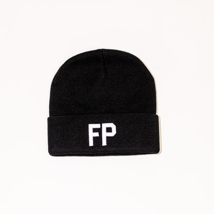Black ribbed knit beanie with folded cuff, featuring an embroidered FP logo on the front.
