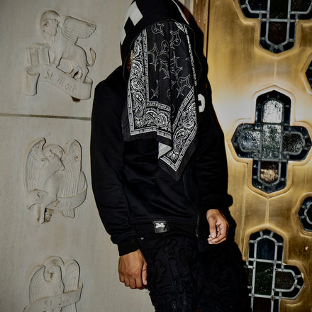 Black bandana featuring custom False Promises design, crafted from soft, breathable fabric, perfect for adding a statement streetwear accessory to any outfit.