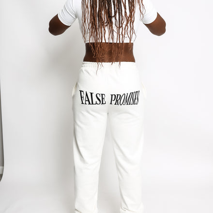 White women's sweatpants crafted from 100% French Terry cotton, designed for a relaxed fit and ultimate comfort.